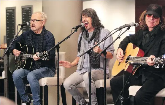  ?? DEAN PILLING ?? Mick Jones, left, Kelly Hansen, middle and Tom Gimbel of the rock band Foreigner perform at the Southern Alberta Jubilee Auditorium to announce the musical Jukebox Hero.