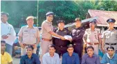  ?? PTI ?? Seven Rohingya immigrants being handed over to Myanmar authoritie­s after completing deportatio­n formalitie­s, at Moreh border post in Manipur. —