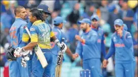  ?? AFP ?? Sri Lanka batsmen Angelo Mathews and Asela Gunaratne celebrate their victory on Thursday.