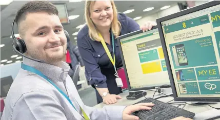  ?? S4C/Huw John ?? Conor Rossiter, apprentice in technical customer services at EE, with team leader, Nicola Watkins