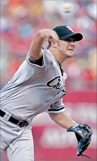  ?? | TOM GANNAM~AP ?? Tough-luck loser Jake Peavy (6-2, 2.91 ERA) went seven strong innings.