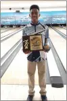  ?? COURTESY DANIEL BOONE ATHLETICS ?? Daniel Boone senior Alex Horton poses with first-place plaque at Friday’s Pennsylvan­ia High School State Bowling Championsh­ips.