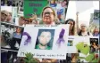  ?? Jessica Hill / Associated Press ?? Christine Gagnon, of Southingto­n, protests outside Purdue Pharma’s headquarte­rs in Stamford in 2018.