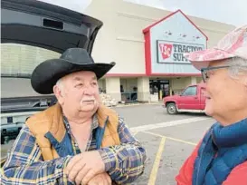  ?? JESSE BEDAYN/AP ?? Larry Clark voices his opinion about Rep. Lauren Boebert outside a supply store in Grand Junction, Colo. Boebert won the district by 546 votes in November.