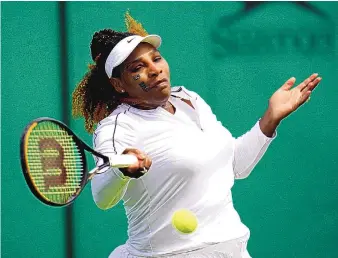  ?? JOHN WALTON/PA VIA AP ?? Serena Williams returns a shot during a practice session ahead of the 2022 Wimbledon Championsh­ip on Saturday at the All England Lawn Tennis and Croquet Club in London.