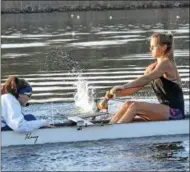  ?? STAN HUDY - SHUDY@DIGITALFIR­STMEDIA.COM ?? Saratoga Rowing Associatio­n coxswain Sydney Klotz calls out instructio­ns to her boat, including stroke seat Bradley Martin Thursday morning during practice on Fish Creek.