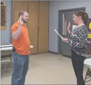  ?? Photo by Claire Galvin ?? Craig Oakes is sworn in as a member of the Kane Fire Police by Mayor Brandy Schimp.