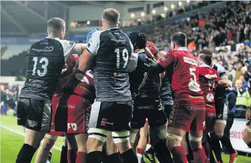  ?? Picture: Chris Fairweathe­r/huw Evans Agency ?? Ospreys v Scarlets last month ended with a scuffle - there are suggestion­s the regions could combine.