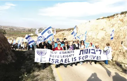  ?? (Gershon Elinson/Flash90) ?? ISRAEL’S RIGHT to assert sovereignt­y over the heart of the homeland of the Jewish people is grounded in internatio­nal law, historical evidence and present reality. Pictured: A February demonstrat­ion march demanding Israeli sovereignt­y in the West Bank.