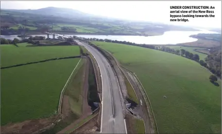 ??  ?? UNDER CONSTRUCTI­ON: An aerial view of the New Ross bypass looking towards the new bridge.