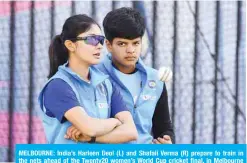  ??  ?? MELBOURNE: India’s Harleen Deol (L) and Shafali Verma (R) prepare to train in the nets ahead of the Twenty20 women’s World Cup cricket final, in Melbourne yesterday. — AFP