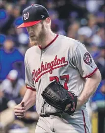  ?? Tannen Maury European Pressphoto Agency ?? STEPHEN STRASBURG shakes off the effects of a virus to deliver a dominant performanc­e for the Washington Nationals.