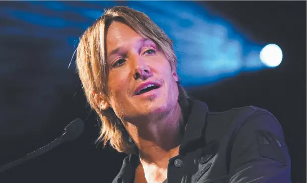  ?? Picture: AAP IMAGE/MICK TSIKAS ?? GOOD SPIRITS: Country music artist Keith Urban spoke to the media at an event in Sydney yesterday ahead of Sunday’s big rugby league final.