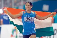  ?? AP ?? India’s Dutee Chand celebrates after her second place finish in the women’s 100m final during the athletics competitio­n. —