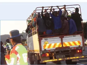  ?? ?? Transporti­ng passengers on tipper trucks is not tolerated and constitute­s an offence.