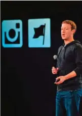  ??  ?? MENLO PARK: This file photo taken on June 19, 2013 shows Facebook CEO Mark Zuckerberg speaking at Facebook's corporate headquarte­rs during a media event. — AFP