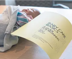  ??  ?? Participan­ts in Sunnybrook hospital’s grandparen­t class are taught the same curriculum on safe sleeping, feeding and baby care that their children learn.