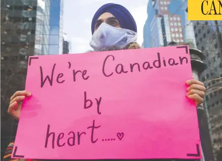  ?? GRAHAM HUGHES/THE CANADIAN PRESS FILES ?? Quebec Premier François Legault has been the target of protests urging the government to give permanent residency status to migrant workers.