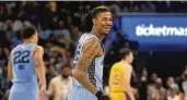  ?? BRANDON DILL / ASSOCIATED PRESS ?? Memphis Grizzlies guard Ja Morant (12) reacts during a game against the Los Angeles Lakers, on April 26, in Memphis, Tenn.