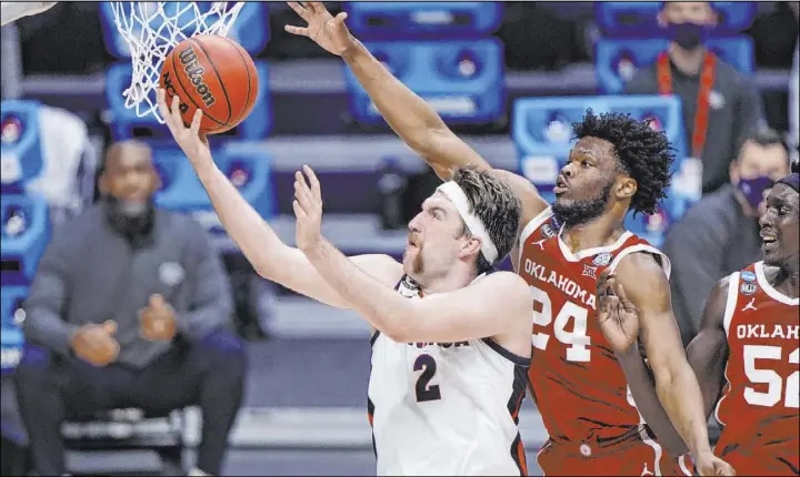  ?? AJ Mast The Associated Pres ?? Gonzaga forward Drew Timme is averaging 20 points per game in the NCAA Tournament, including a career-high 30 against Oklahoma in the second round.