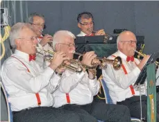  ?? FOTO: SCHNEELE ?? Die Röttinger Blasmusik hat bei ihrem Konzert die Filmmusik der DisneyFilm­e hochleben lassen.