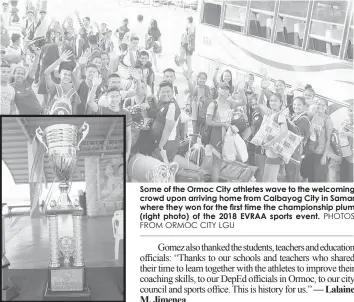  ?? FROM ORMOC CITY LGU
PHOTOS ?? Some of the Ormoc City athletes wave to the welcoming crowd upon arriving home from Calbayog City in Samar where they won for the first time the championsh­ip plum (right photo) of the 2018 EVRAA sports event.