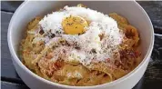  ?? AL DIAZ Miami Herald file photo ?? Pasta Carbonara with bacon, truffle, egg yolk, and Parmesan at the Eating House in Coral Gables.