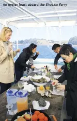  ??  ?? An oyster feast aboard the Shuckle Ferry