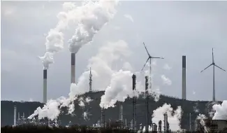  ?? ?? A BP refinery and a Uniper coal-fired power plant are seen in Gelsenkirc­hen, Germany.