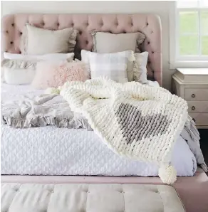  ??  ?? A chunky knit throw from the Jillian Harris x Etsy Canada collection.