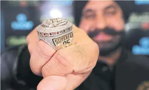  ?? STEVE RUSSELL TORONTO STAR FILE PHOTO ?? The 2019-20 season started with rings — in this case, one belonging to Raptors Superfan Nav Bhatia — and an overtime win against the New Orleans Pelicans back in October.