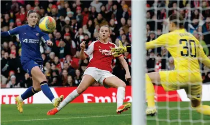  ?? Photograph: Tom Jenkins/The Guardian ?? Alessia Russo scores Arsenal’s third goal against Chelsea.