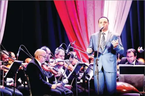  ?? MOHAMED EL-SHAHED/AFP ?? Egyptian classical Arabic music singer Ahmed Adel performs a song by celebrated 20th century Egyptian composer Mohamed Abdel Wahab at the Arab Music Institute Theatre in the Egyptian capital Cairo on January 20.