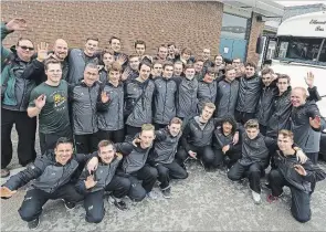  ?? CLIFFORD SKARSTEDT/EXAMINER ?? Adam Scott rugby players and coaches gather for a team photo before embarking on a European tour on Wednesday.