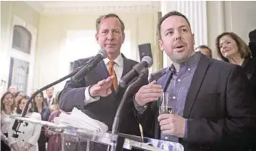  ?? — AFP ?? US chef Aaron Silverman (R) speaks with Michelin Guides’ internatio­nal director Michael Ellis after being awarded two stars for his restaurant Pineapples & Pearls during the launch of the first Michelin Red Guide for Washington at the residence of the...