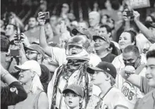  ?? Brett Coomer / Staff photograph­er ?? “It’s a special fan base,” says Astros catcher Jason Castro, who appreciate­s Houstonian­s’ support through good and bad times.