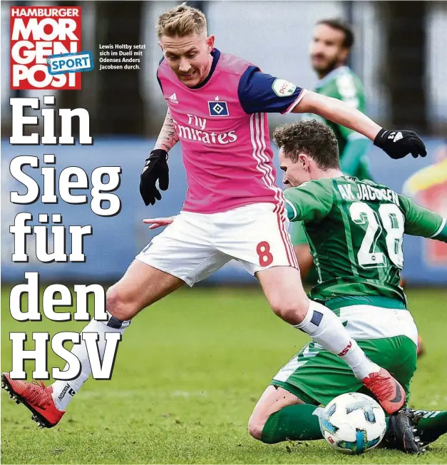  ??  ?? Lewis Holtby setzt sich im Duell mit Odenses Anders Jacobsen durch.