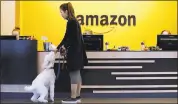  ?? ELAINE THOMPSON — THE ASSOCIATED PRESS ?? Amazon is promising to bring 50,000 jobs to its new location. It will announce a decision sometime in 2018.