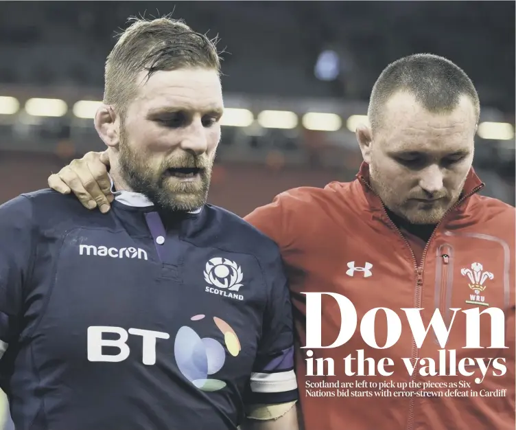  ??  ?? 0 Scotland captain John Barclay is consoled by Welsh hooker Ken Owens. Barclay’s side lost 34-7 in Wales and must now aim to restore pride at home to France this weekend. Report/analysis: