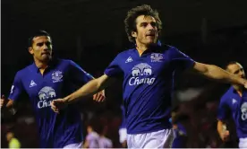  ?? Photograph: Stu Forster/Getty Images ?? Everton’s Leighton Baines (right) celebrates after equalising from the spot in a 1-1 draw at Sunderland in December 2011.