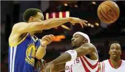  ?? — AFP ?? Stephen Curry ( left) of the Golden State Warriors in action against Jason Terry of the Houston Rockets during Game Four of their Western Conference final in Houston, Texas, on Monday. The Rockets won 128- 115.