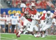  ?? TIM HEITMAN / USA TODAY SPORTS ?? Wisconsin wide receiver Quintez Cephus carries the ball in the Cotton Bowl. Cephus played in 12 games last season.