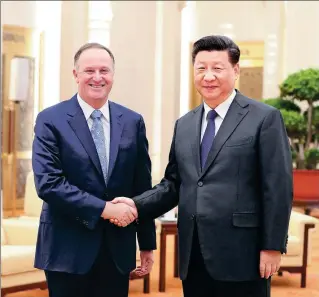  ?? FENG YONGBIN / CHINA DAILY ?? President Xi Jinping meets with former New Zealand prime minister John Key at the Great Hall of the People in Beijing on Wednesday.