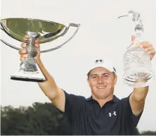  ?? Sam Greenwood / Getty Images ?? Jordan Spieth displays the hardware for winning both the Tour Championsh­ip and the FedExCup.