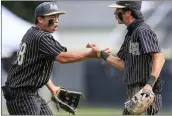  ?? SHAE HAMMOND — STAFF PHOTOGRAPH­ER ?? Archbishop Mitty's Noah Pang, left, celebrates with teammate David Estrada during the fourth inning in the CIF NorCal Division II championsh­ip game Saturday.