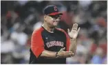  ?? SCHWANE AP PHOTO/RON ?? Cleveland Guardians manager Terry Francona makes a pitching change during the team’s baseball game against the Houston Astros, in 2022, in Cleveland.