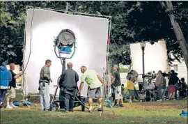  ?? Al Seib Los Angeles Times ?? CREW on a set at L.A. City Hall. Ramped-up production is taking toll on workers.