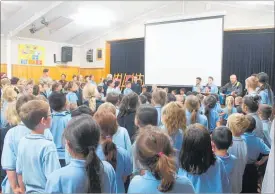  ??  ?? SOUTH School students accompany Tama Ngatai-Ruaporo in singing The New Zealand Soldier song.