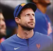  ?? Elsa / Getty Images ?? Max Scherzer was scheduled to get the start for the Mets against the Phillies on Friday night before the game was postponed by rain.