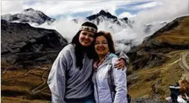  ?? CONTRIBUTE­D ?? Olivia Roberts (left) stands with her mother, Beda, on one of Olivia’s mission trips in Bolivia. Olivia traveled to Bolivia to work in orphanages.